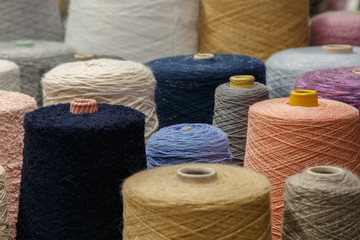 Colorful yarn on spool at the knitting factory.