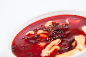 Traditional polish Christmas Eve dish: red borscht with uszka (a mushroom filled kind of dumplings)