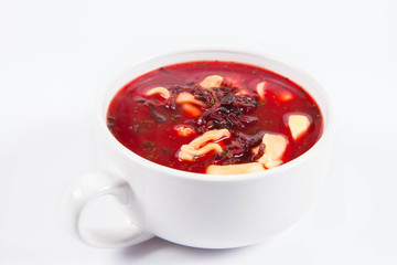 Traditional polish Christmas Eve dish: red borscht with uszka (a mushroom filled kind of dumplings)