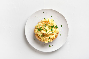 Scrambled eggs on bun