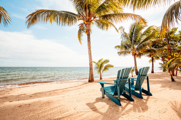 Chairs on tropical beach