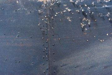 closeup rusty colored metal, abstract grunge corroded steel background, retro vintage metallic backdrop, iron surface with shabby cracked paint and scratches, painted old wall texture strokes