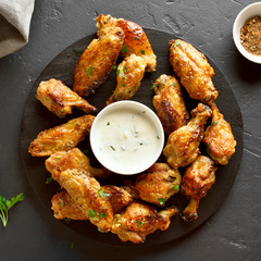 Grilled chicken wings with sauce