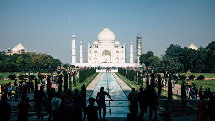 People queuing for a photo next to the Taj Mahal in Agra, India