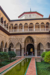 Fototapeta na wymiar Sevilla, Spain - October, 2018: Alcazar Palace in Sevilla. The Alcazar - example of the moorish architecture in Spain.