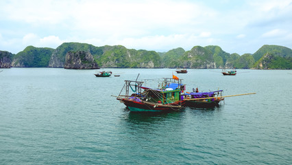 Traditional fishing boats in Ha Long Bay, Vietnam