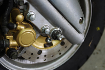 Motor scooter caliper and disc brake