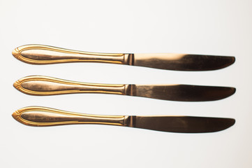 Knives composition on white background