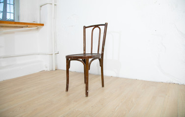 wooden chair in loft room