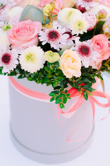 The composition of flowers on top.