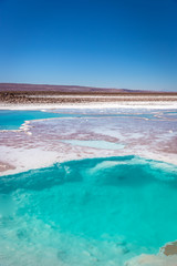 Beautiful blue water lagoon in the middle of the Atacama Desert in Chile