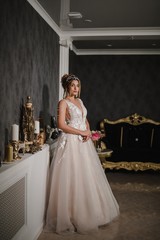 Beautiful model in a modern wedding dress.