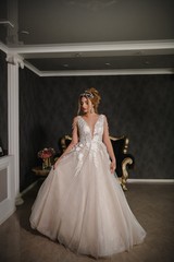 Fototapeta premium Beautiful model in a modern wedding dress.