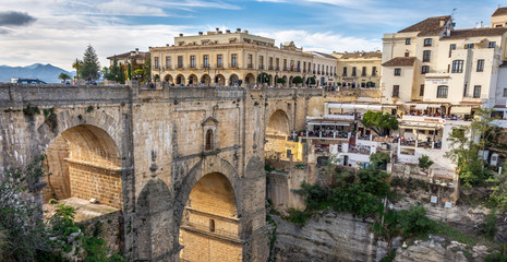 Naklejka na ściany i meble The historic bridge in the white Spanish town Ronda.