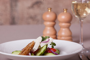 Greek salad with white wine
