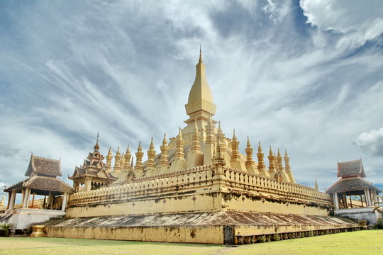 Pha That Luang in bright sky day. Vientiane, Laos