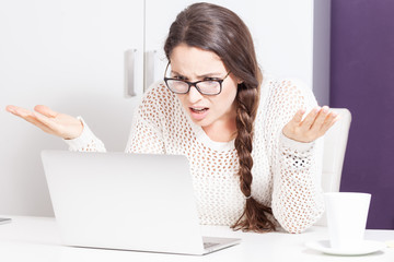  Displeased woman having problem of computer error cyber security attack