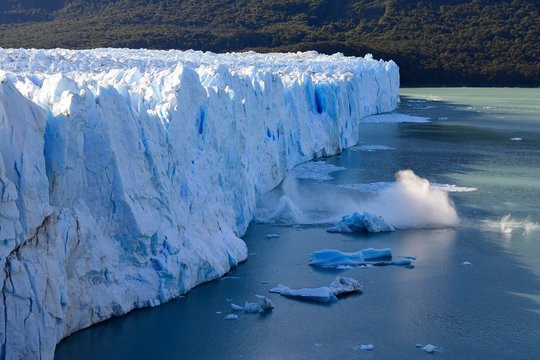 Perito Moreno Glacier calves, ice breaks into sea, Argentina