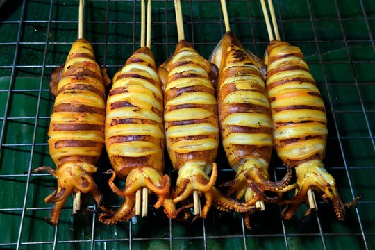 Grilled squid skewers, Naka Weekend Market, Phuket, Thailand