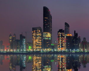 Fototapeta na wymiar Skyscrapers in the evening, Abu Dhabi, United Arab Emirates