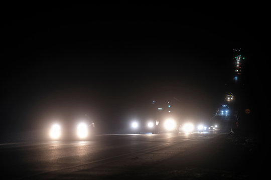 cars on a highway in an evening