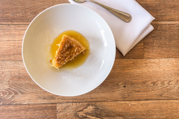 Slice of tapioca pudding on white plate