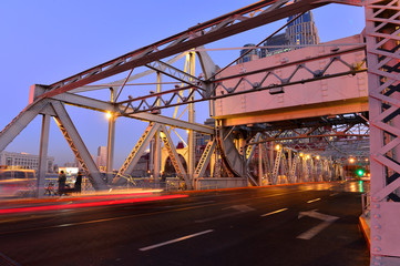 Fototapeta na wymiar The modern city highway Bridges night landscape car light trails arc in tianjin