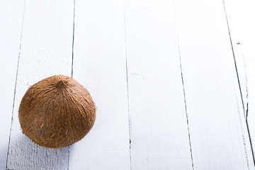 coconut on white wooden table background