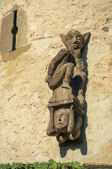 Gargoyle on side of building