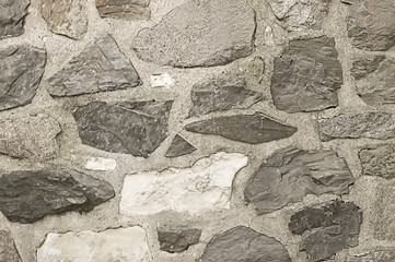Old grey stone wall background texture