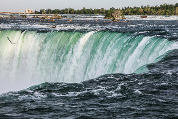 Fototapeta na wymiar Close up view of the horse shoe falls at Niagara Falls in Ontario