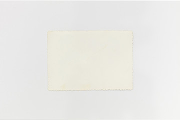 vintage blank photo paper on white background