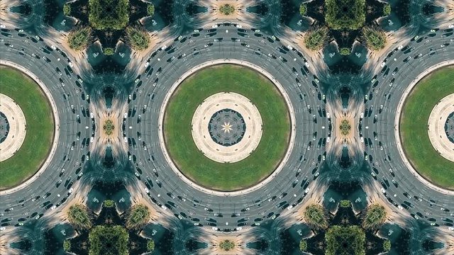Kaleidoscope effect of aerial top-down view of roundabout road traffic