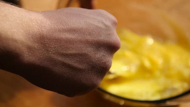 Whisking Eggs in a Bowl in the Morning
