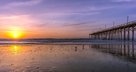 Fototapeta na wymiar panoramic view of sunset on the beach