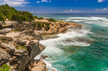 Cliffs along the Mahaulepu Heritage Beach Trail in Kauai, Hawaii, USA