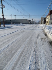 Obraz premium 北海道の冬の道路