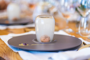 Gourmet food at a vineyard in Casablanca, Chile, an amazing preparation of this delicatessen that comes with a glass full of smoke to have a really smoky modern dish of the typical new food
