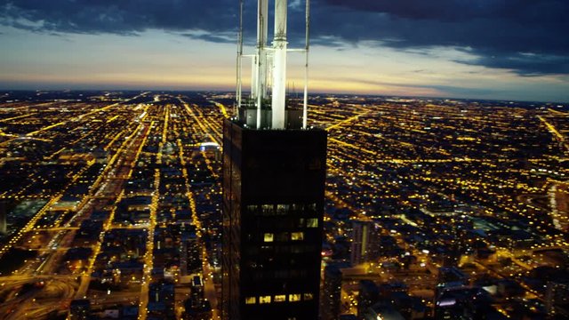 Aerial close up night view of Sears Tower and Chicago city USA
