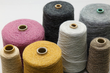 Colorful yarn on spool at the knitting factory.