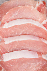 Slices of fresh loin for cooking meal