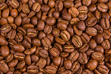 Background of many roasted coffee beans