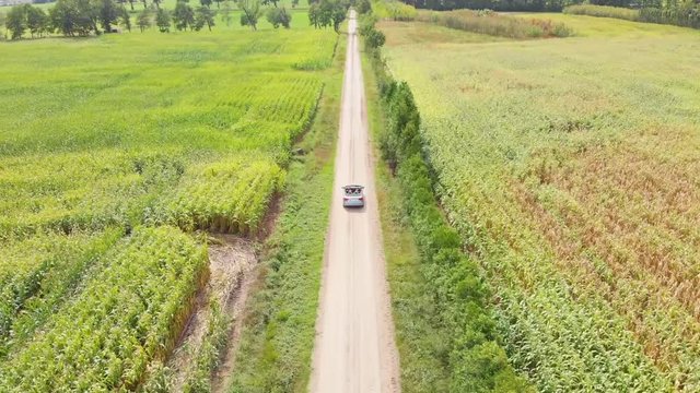 Active track drone shot of a car