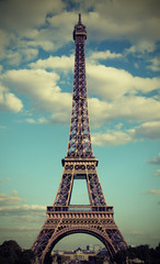 Fototapeta na wymiar Eiffel Tower in Paris France with white clouds with photograph e