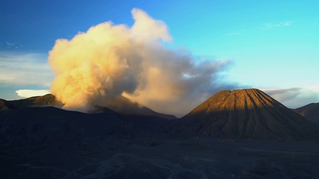 Mt Bromo volcano summit erupting delta mud flows Java National Park Indonesia