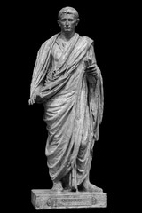 Caesar Octavianus Augustus roman emperor adopted son of Julius Caesar. Isolated statue on black