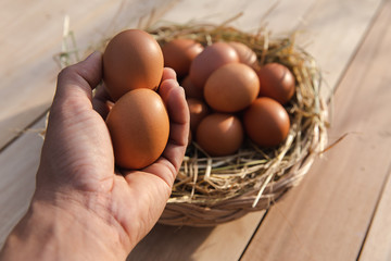 Egg basket on wooden floor