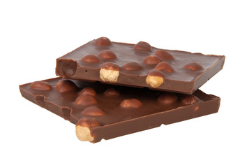 Tasty chocolate with hazelnuts isolated on the white background