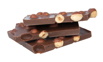 Tasty chocolate with hazelnuts isolated on the white background