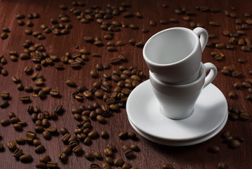 Image of coffee beans and white cup